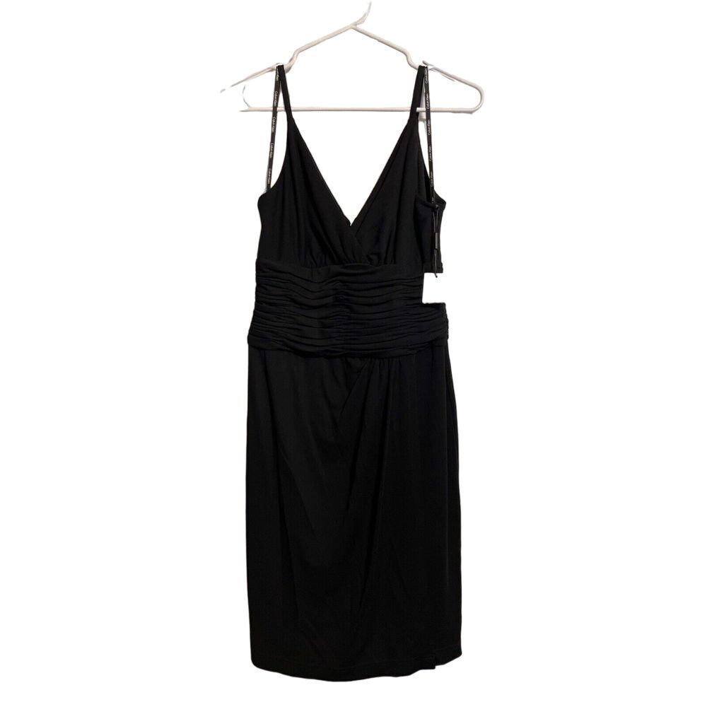 Calvin Klein‎ NWT Black spaghetti strapped dress. Size 4. Perfect party dress.